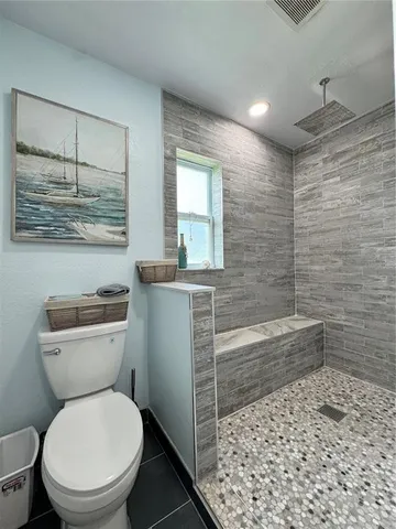 a bathroom with a sink and a shower