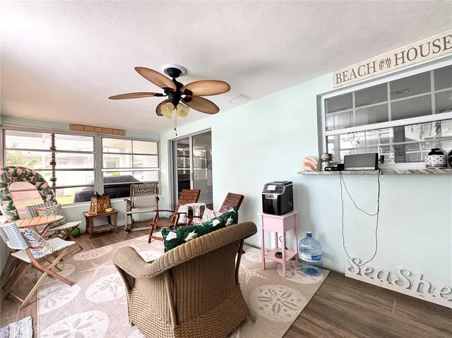 a view of a swimming pool with a patio