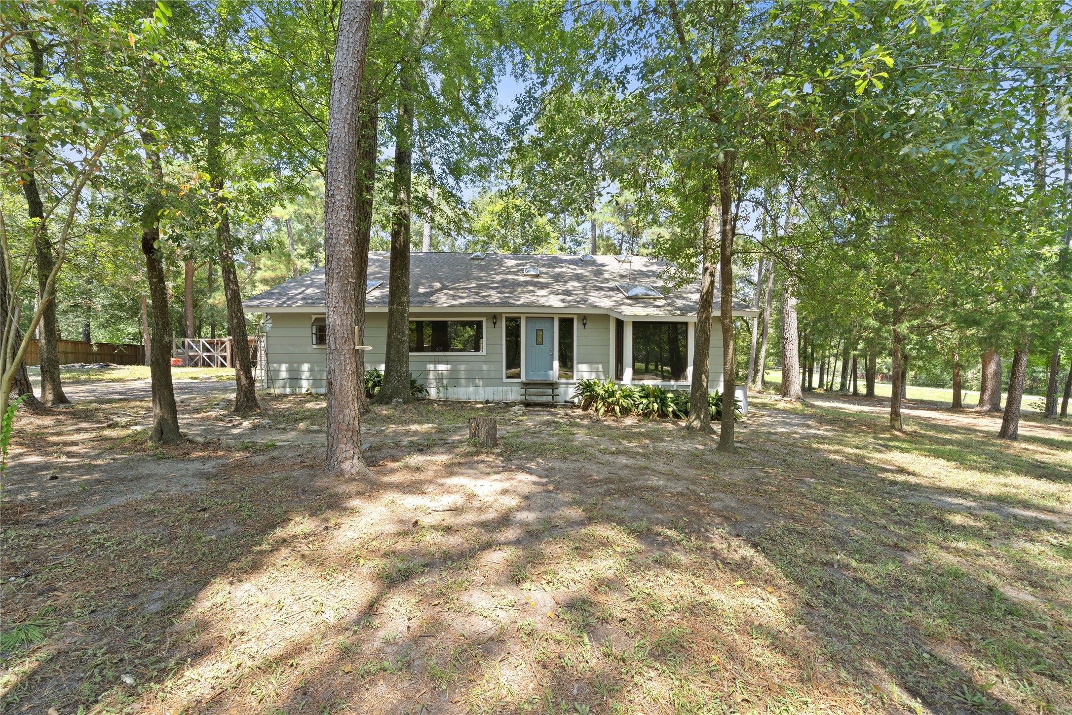 27607 Decker Woods Drive Magnolia, TX 77354 - Photo 1 of 48 a view of a house with a yard