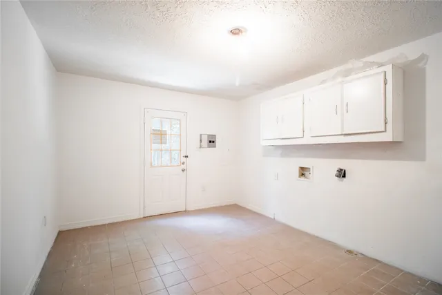 a view of a livingroom with walk in closet and bedroom