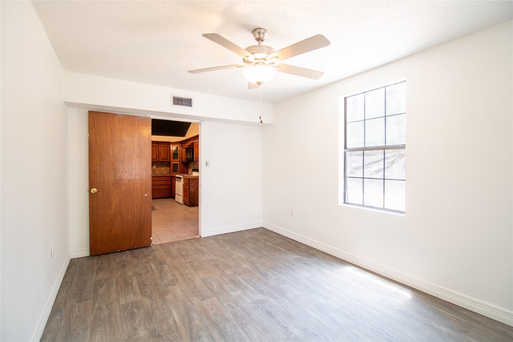 27607 Decker Woods Drive Magnolia, TX 77354 - Photo 18 of 48 an empty room with closet and windows