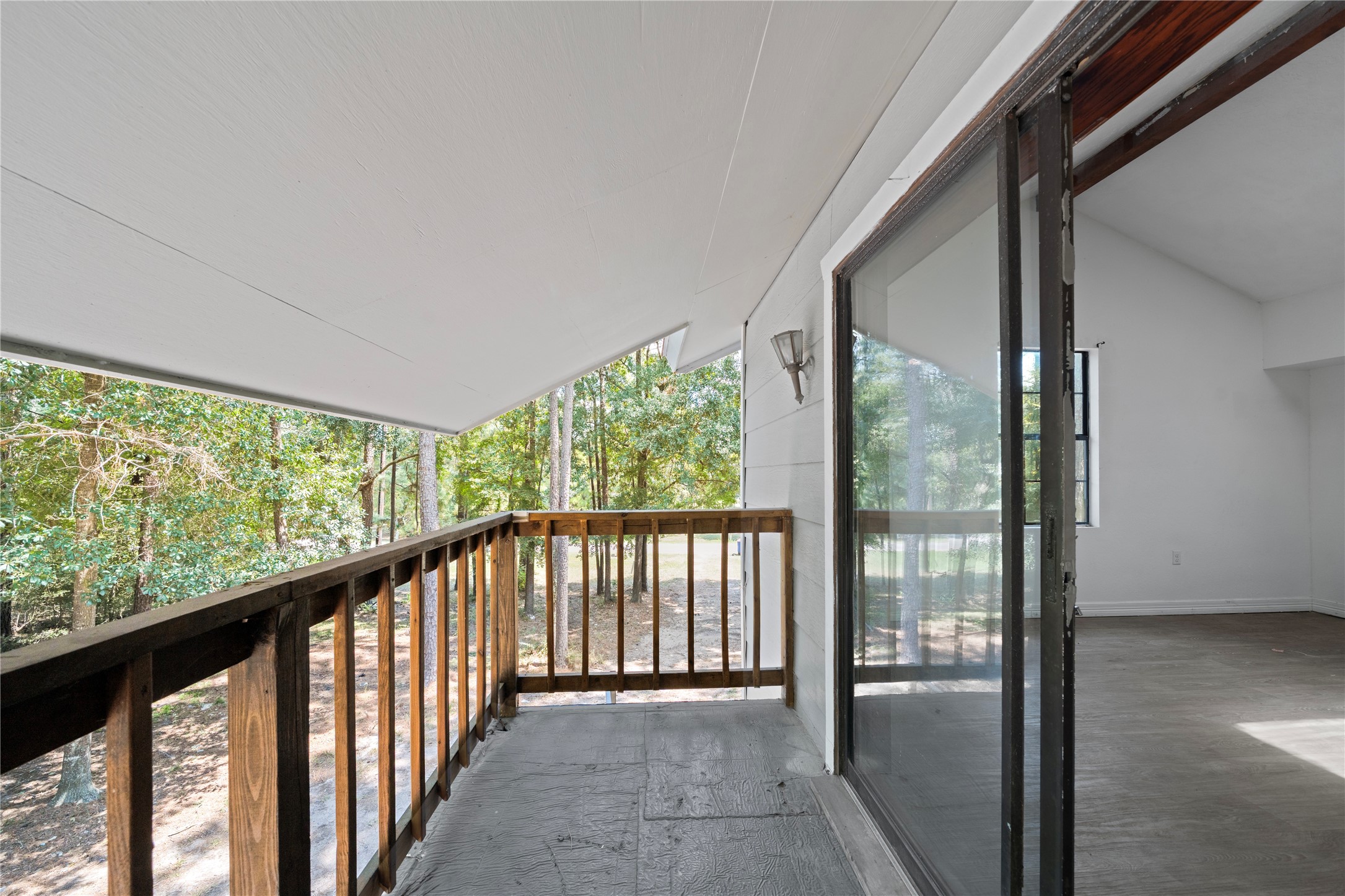 27607 Decker Woods Drive Magnolia, TX 77354 - Photo 26 of 48 a view of a glass door with a balcony