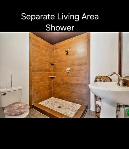 a view of outdoor space with deck and tree