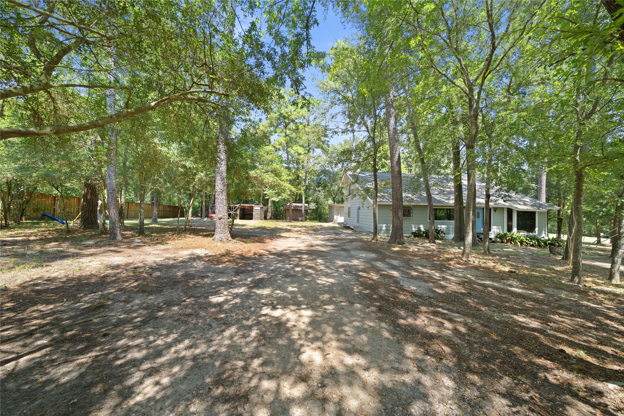 27607 Decker Woods Drive Magnolia, TX 77354 - Photo 38 of 48 a view of outdoor space with deck and tree