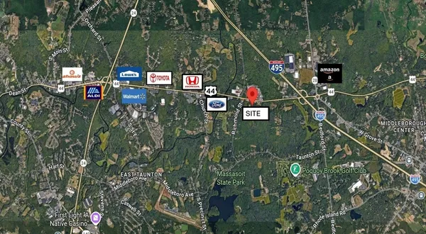 a view of a field with an ocean view