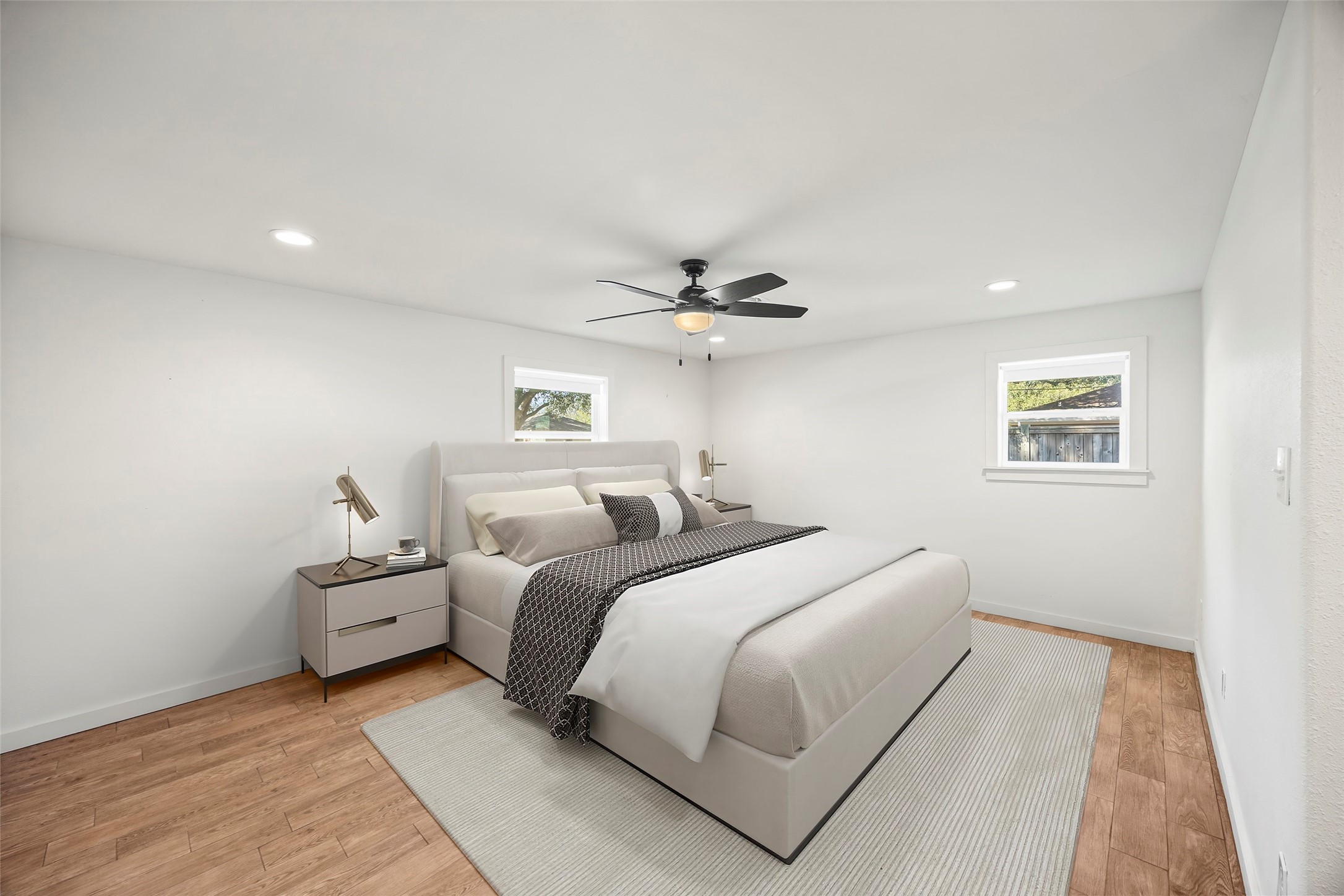 9715 Greenwillow Street Houston, TX 77096 - Photo 23 of 31 a bedroom with a bed and a night stand