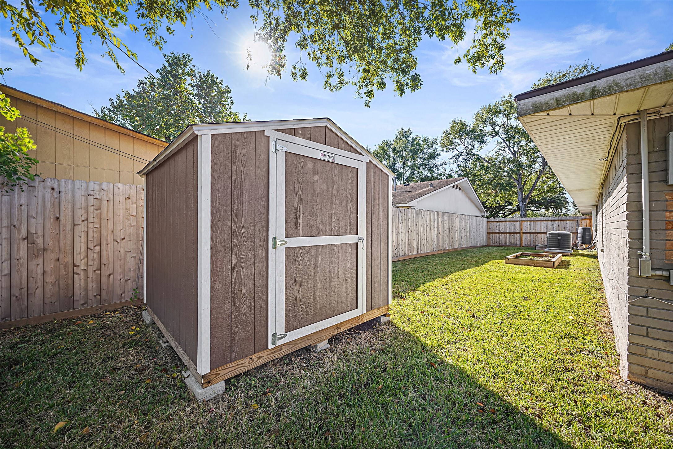 9715 Greenwillow Street Houston, TX 77096 - Photo 31 of 31 a view of backyard with small cabin