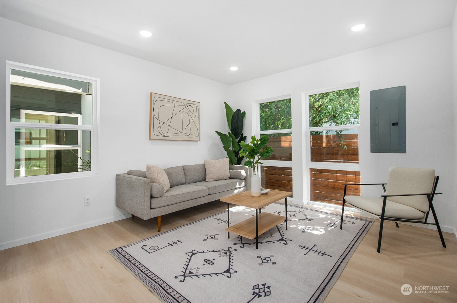 9004 15th Avenue Southwest, Unit A Seattle, WA 98106 - Photo 10 of 20 a living room with furniture and a large window