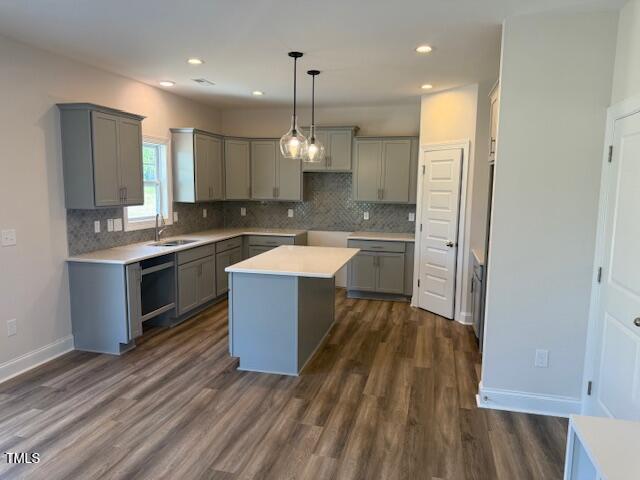 23 Surles Landing Way Benson, NC 27504 - Photo 7 of 18 a large kitchen with a sink and dishwasher stove a refrigerator with wooden floor