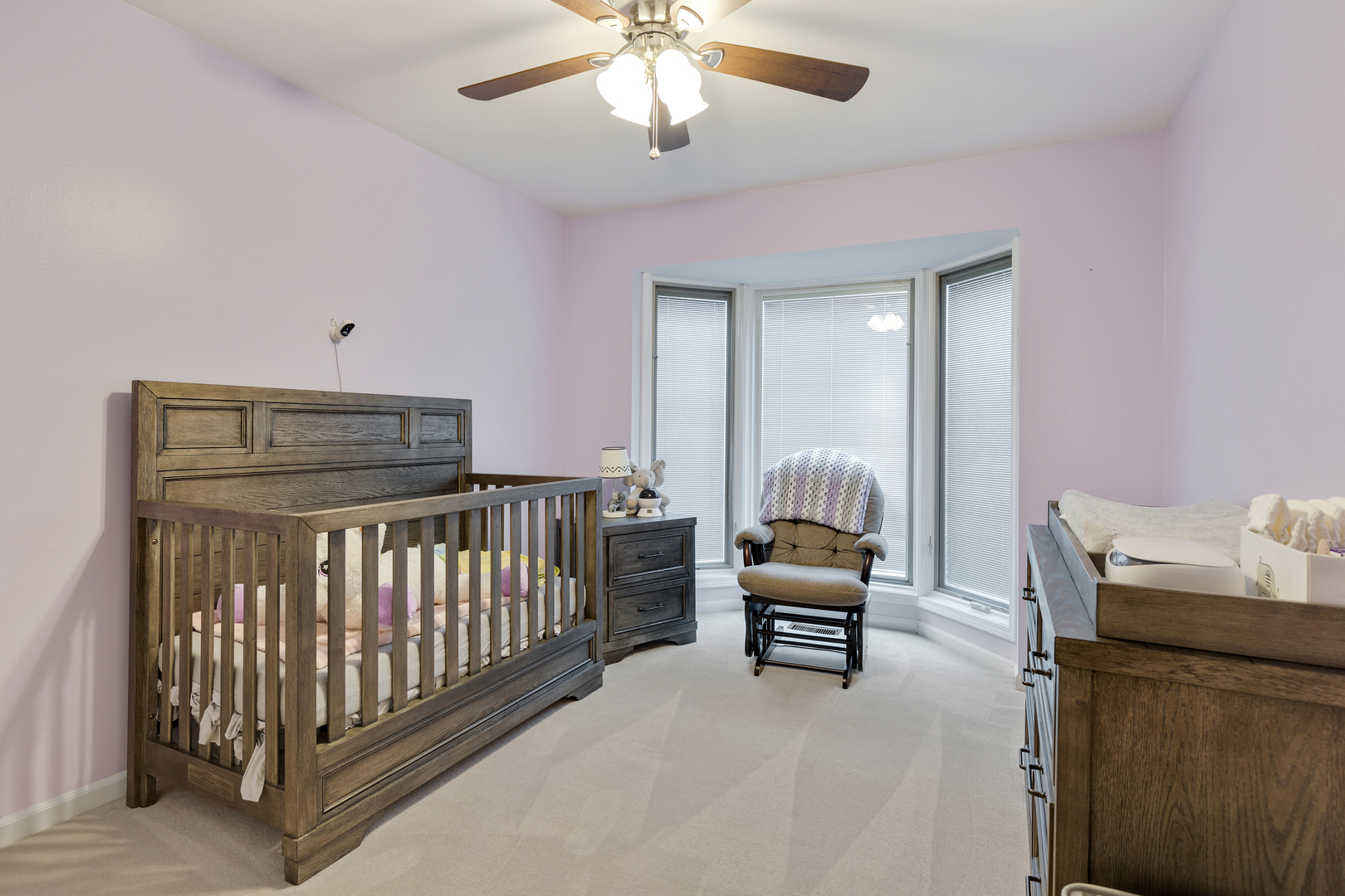 1805 Ashbury Lane, Unit 1805 Inverness, IL 60067 - Photo 16 of 21 a bedroom with furniture and a window