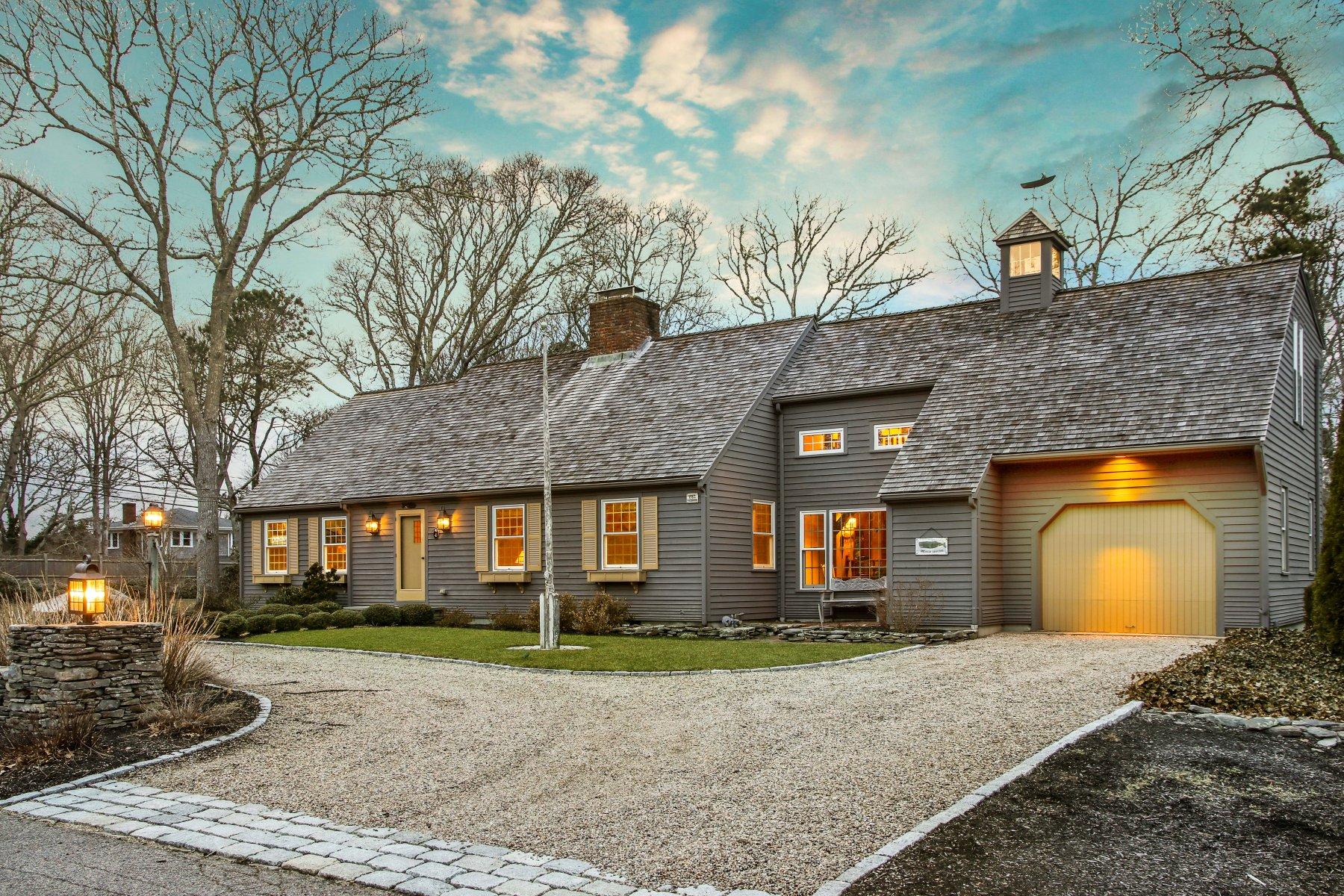 4 Shapquit Bars Road Falmouth, MA 02540 - Photo 36 of 45 a front view of a house with a yard
