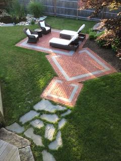 4 Shapquit Bars Road Falmouth, MA 02540 - Photo 38 of 45 a view of a backyard with lawn chairs and a lake