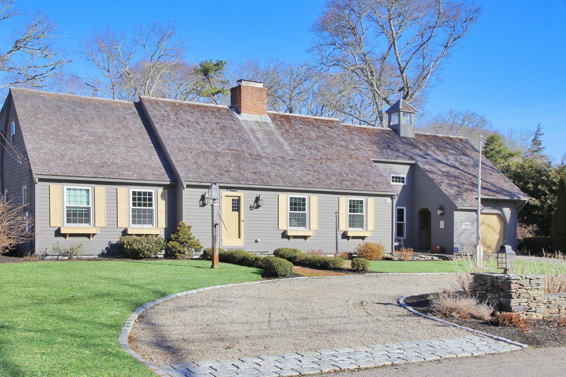 4 Shapquit Bars Road Falmouth, MA 02540 - Photo 4 of 45 a front view of a house with garden