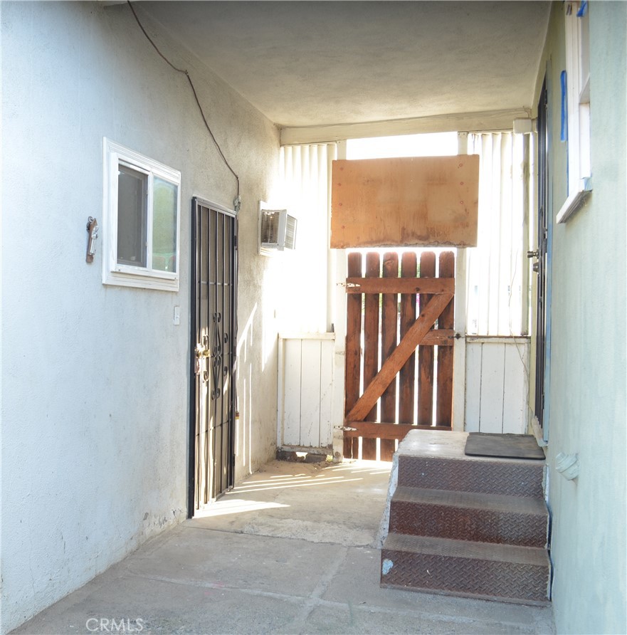 4139 St George Place Riverside, CA 92504 - Photo 42 of 42 Coming from the back yard left access to the ADU and Stairs to the kitchen