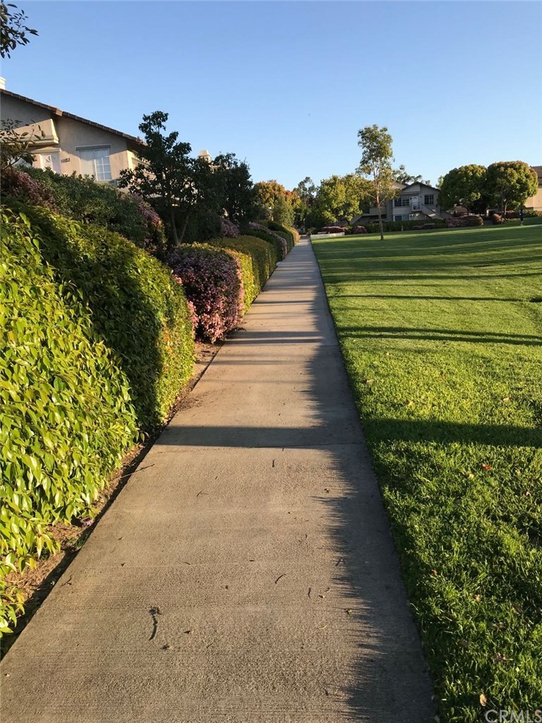14 Columbia Irvine, CA 92612 - Photo 2 of 12 a view of a lake with a building in the background