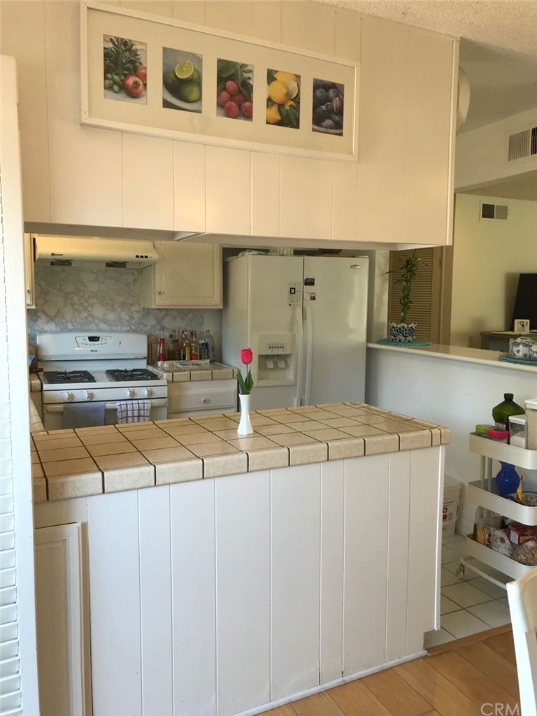 14 Columbia Irvine, CA 92612 - Photo 9 of 12 a bathroom with a sink and a mirror