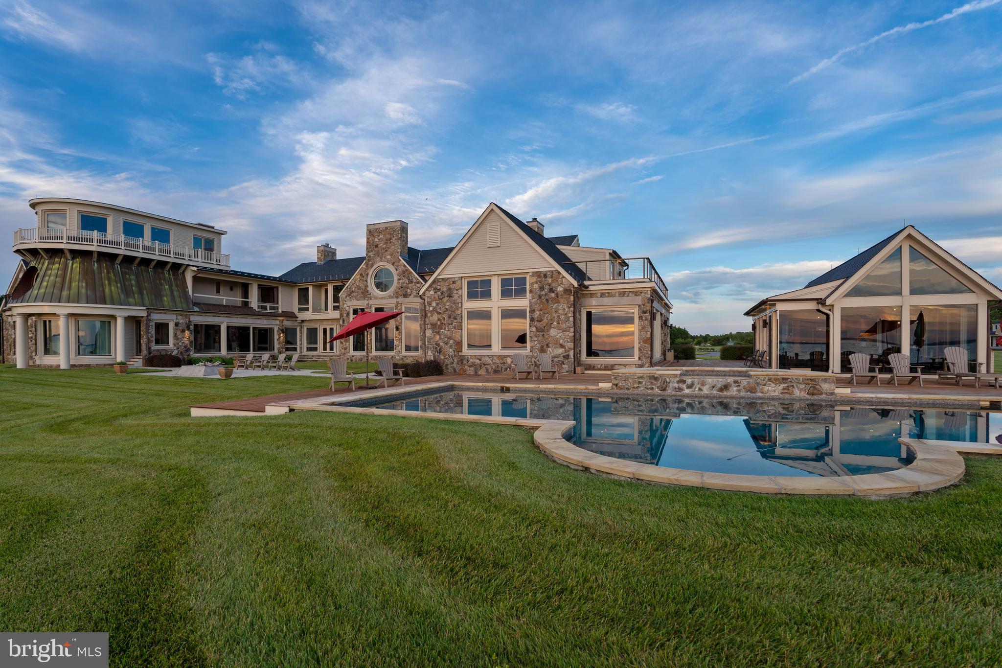 Majestic Bay front Estate with guest + pool house.