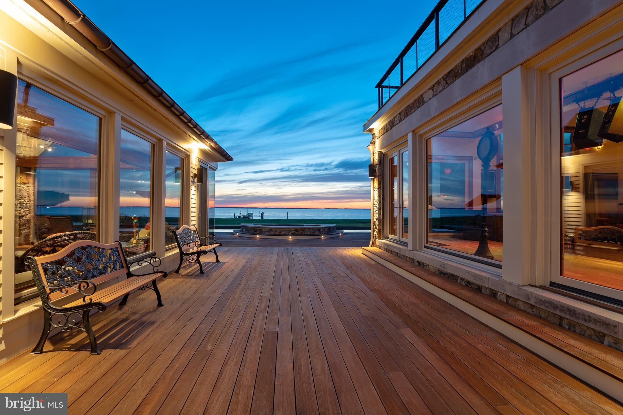 7402 Kent Point Road Stevensville, MD 21666 - Photo 109 of 134 Sunset view from the breezeway to pool + spa
