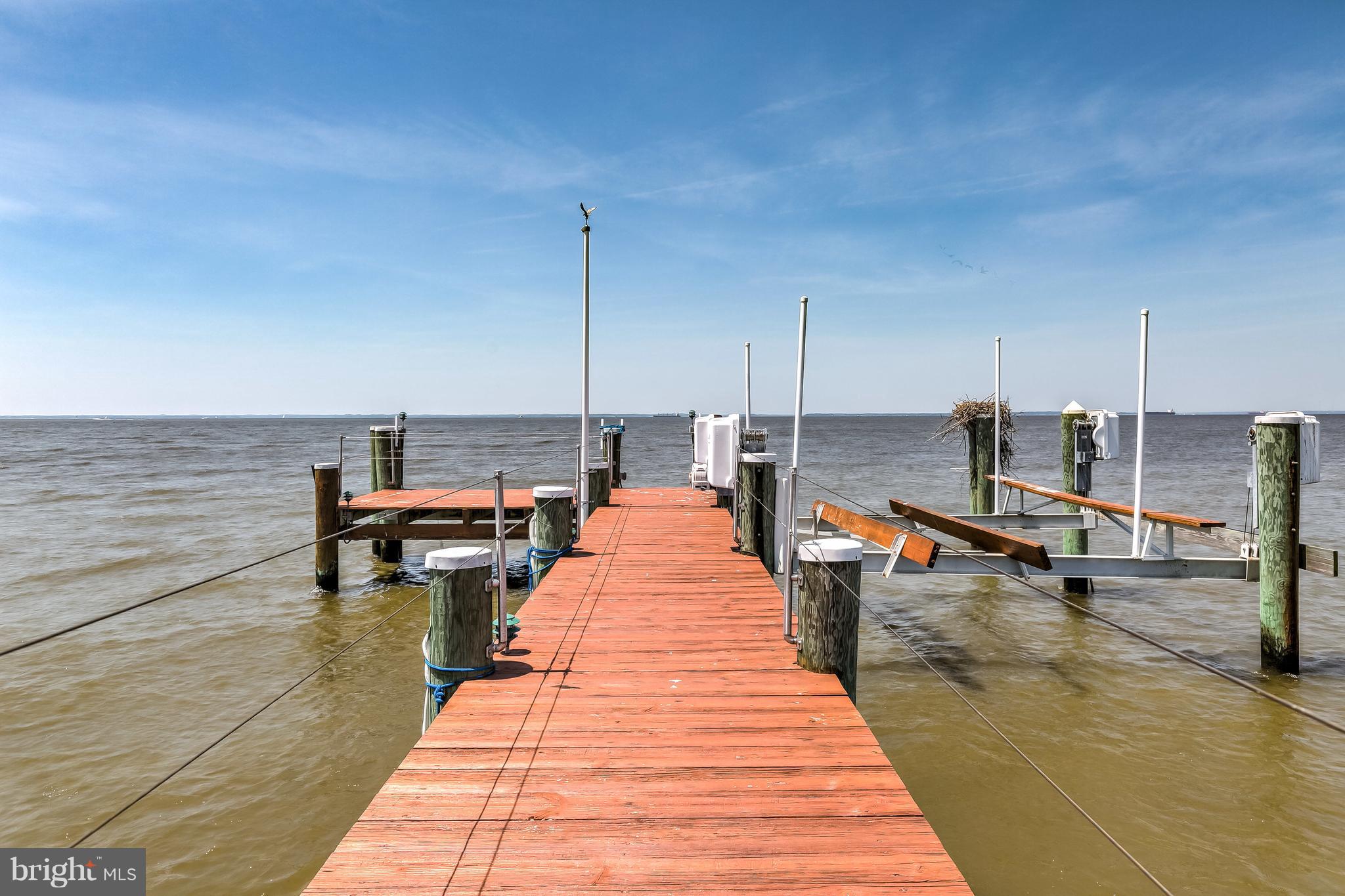 7402 Kent Point Road Stevensville, MD 21666 - Photo 116 of 134 4 motor boatlift and fishing station at pier