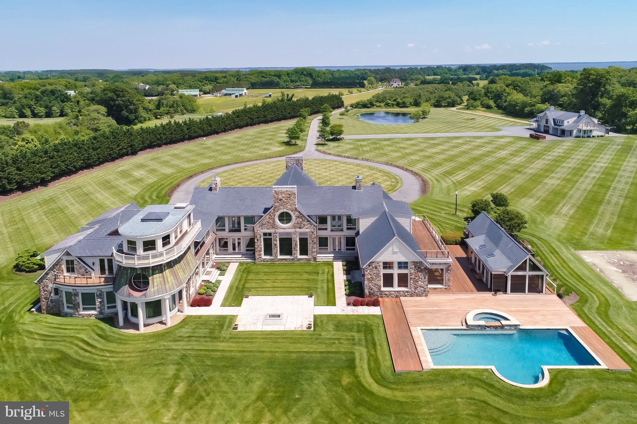 7402 Kent Point Road Stevensville, MD 21666 - Photo 15 of 134 Aerial view with Carriage house at rear and pond