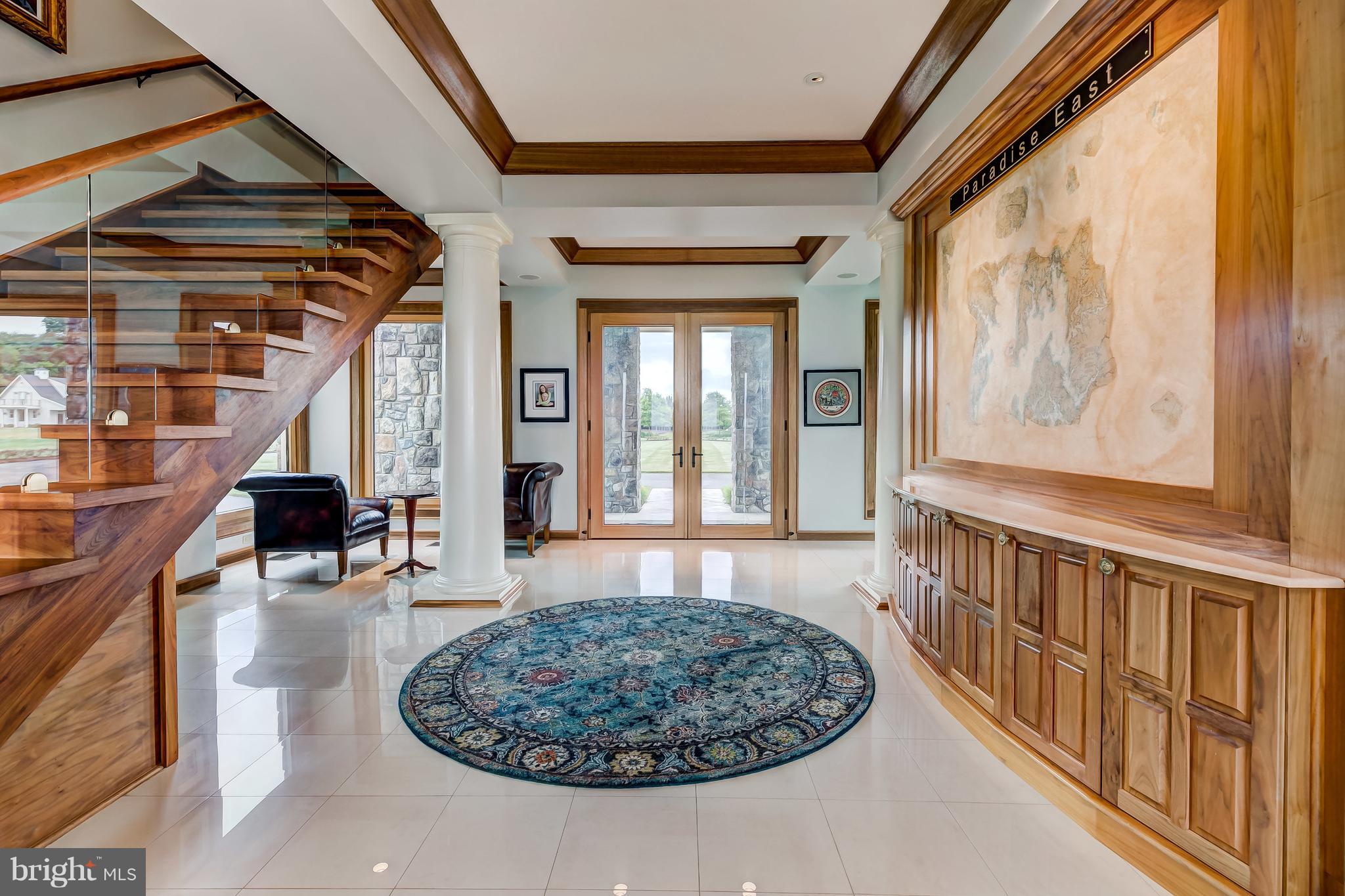 7402 Kent Point Road Stevensville, MD 21666 - Photo 17 of 134 Grand entry foyer with custom built-ins