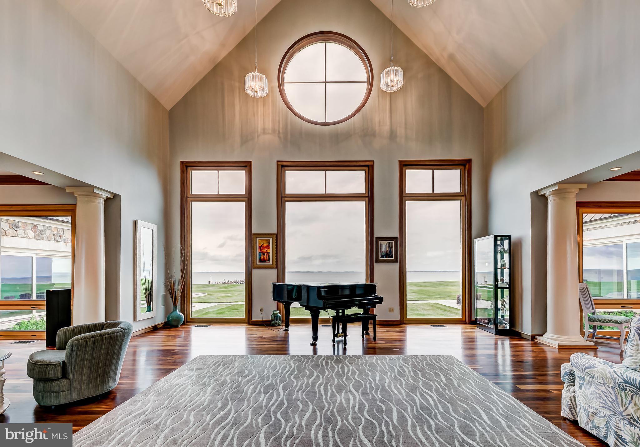 7402 Kent Point Road Stevensville, MD 21666 - Photo 19 of 134 Great room with massive windows off entry
