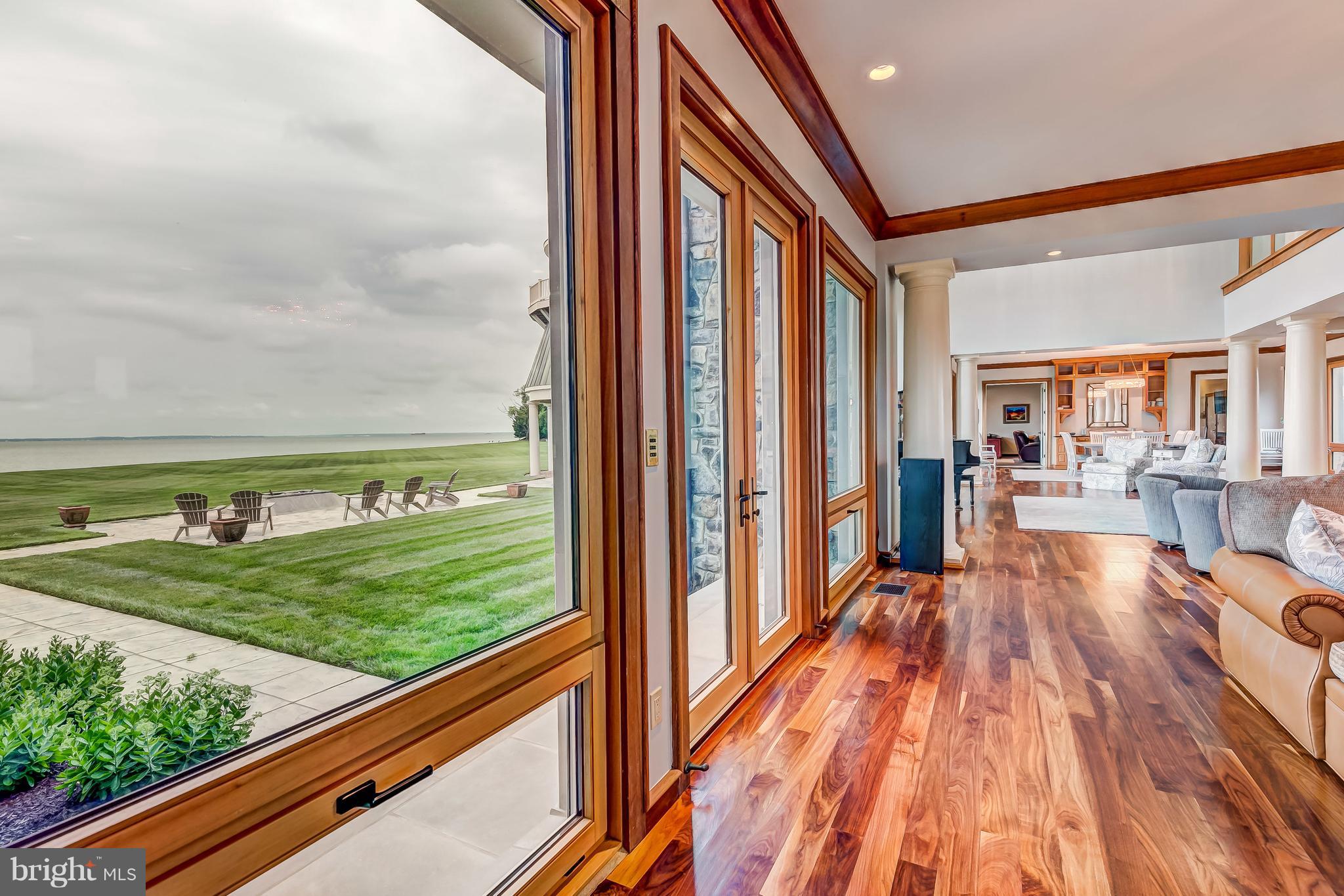 7402 Kent Point Road Stevensville, MD 21666 - Photo 25 of 134 View of patio area with central firepit