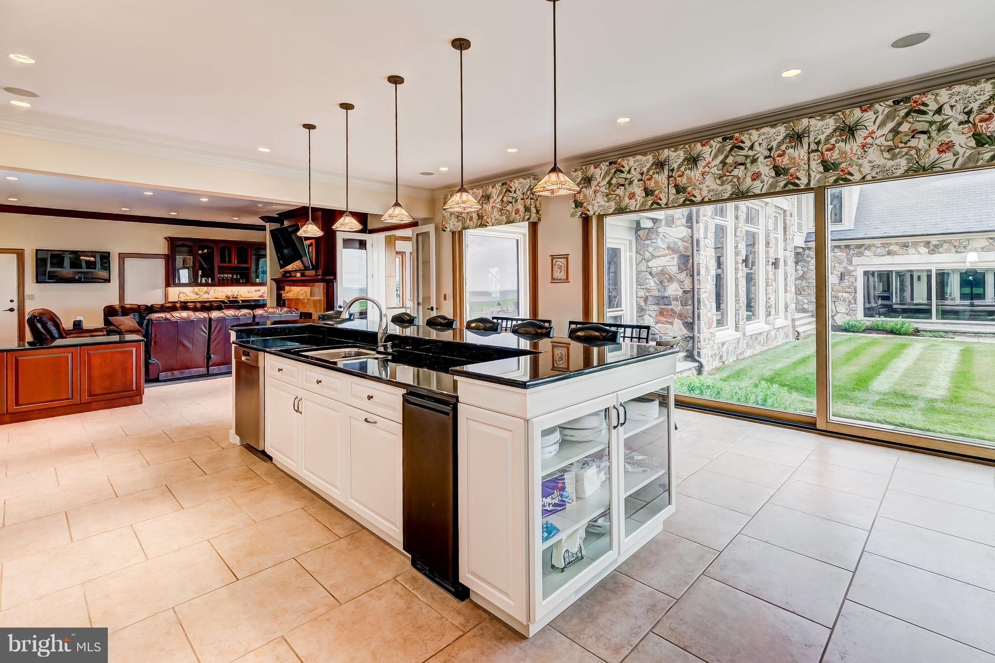 7402 Kent Point Road Stevensville, MD 21666 - Photo 33 of 134 Massive windows give view to second wing of estate