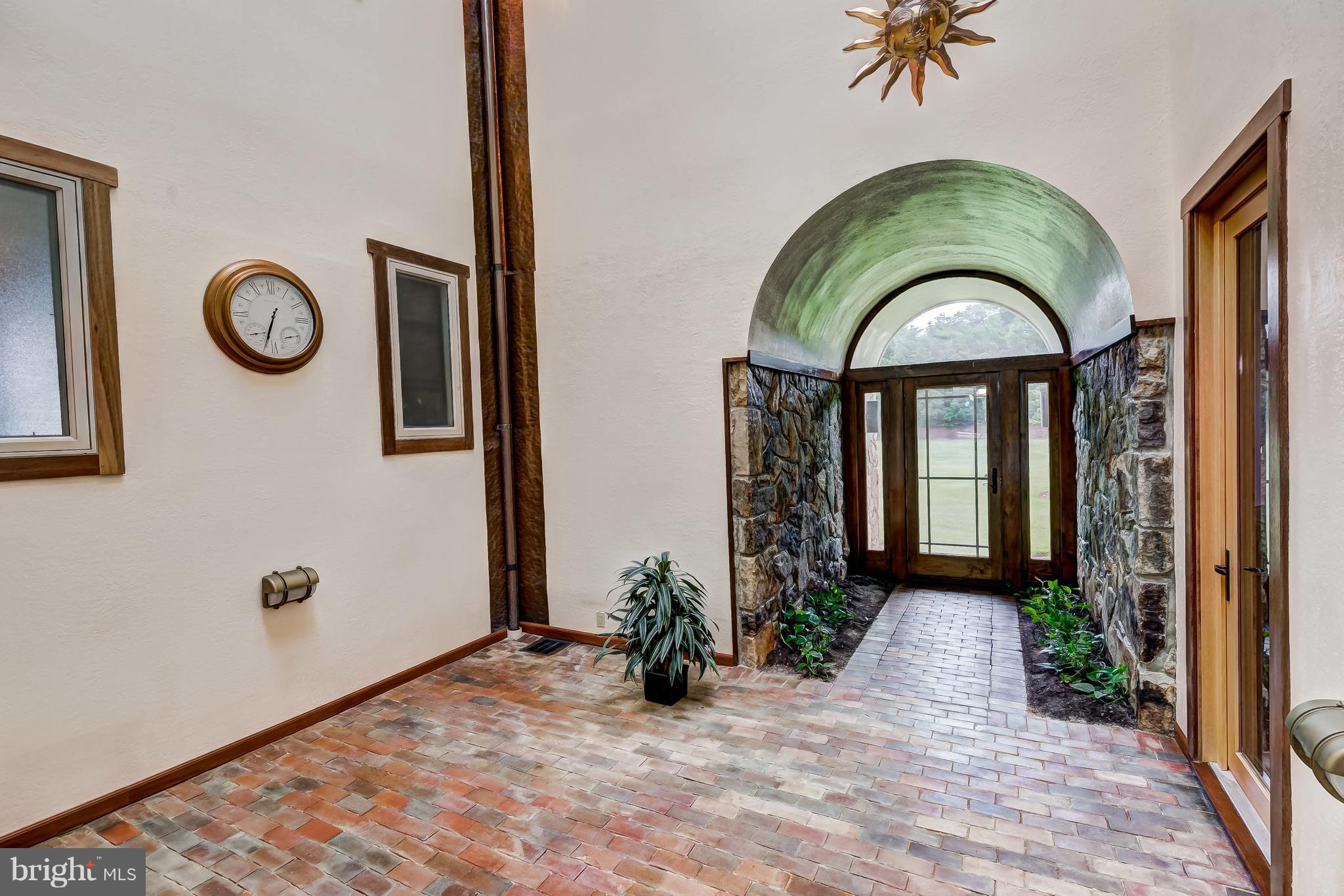 7402 Kent Point Road Stevensville, MD 21666 - Photo 37 of 134 Entryway to atrium from side yard