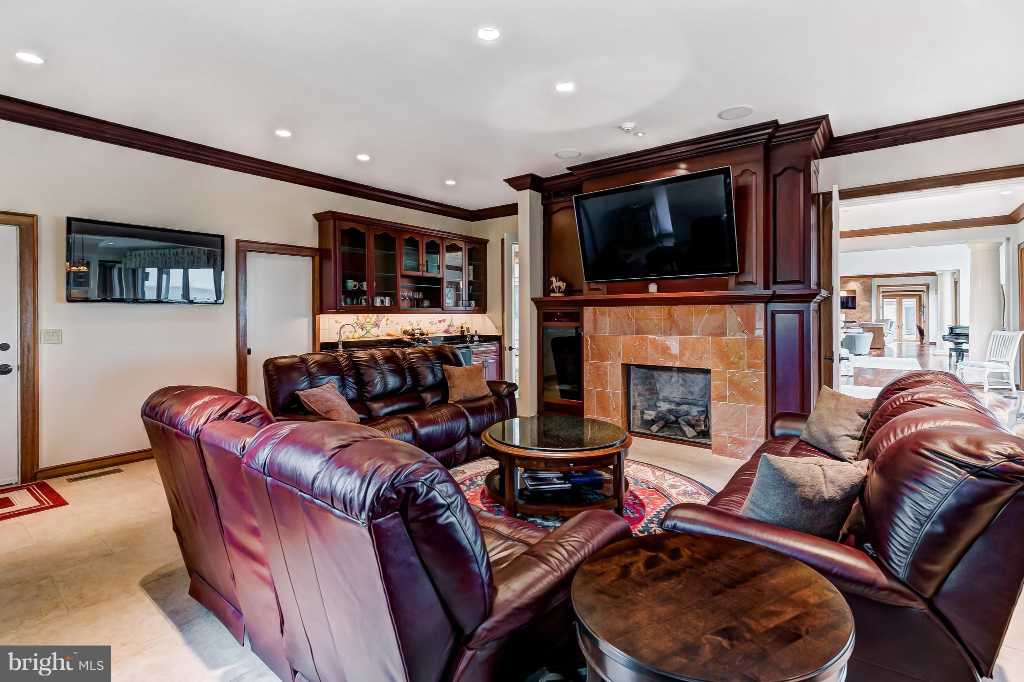 7402 Kent Point Road Stevensville, MD 21666 - Photo 38 of 134 Great Room with fireplace off kitchen