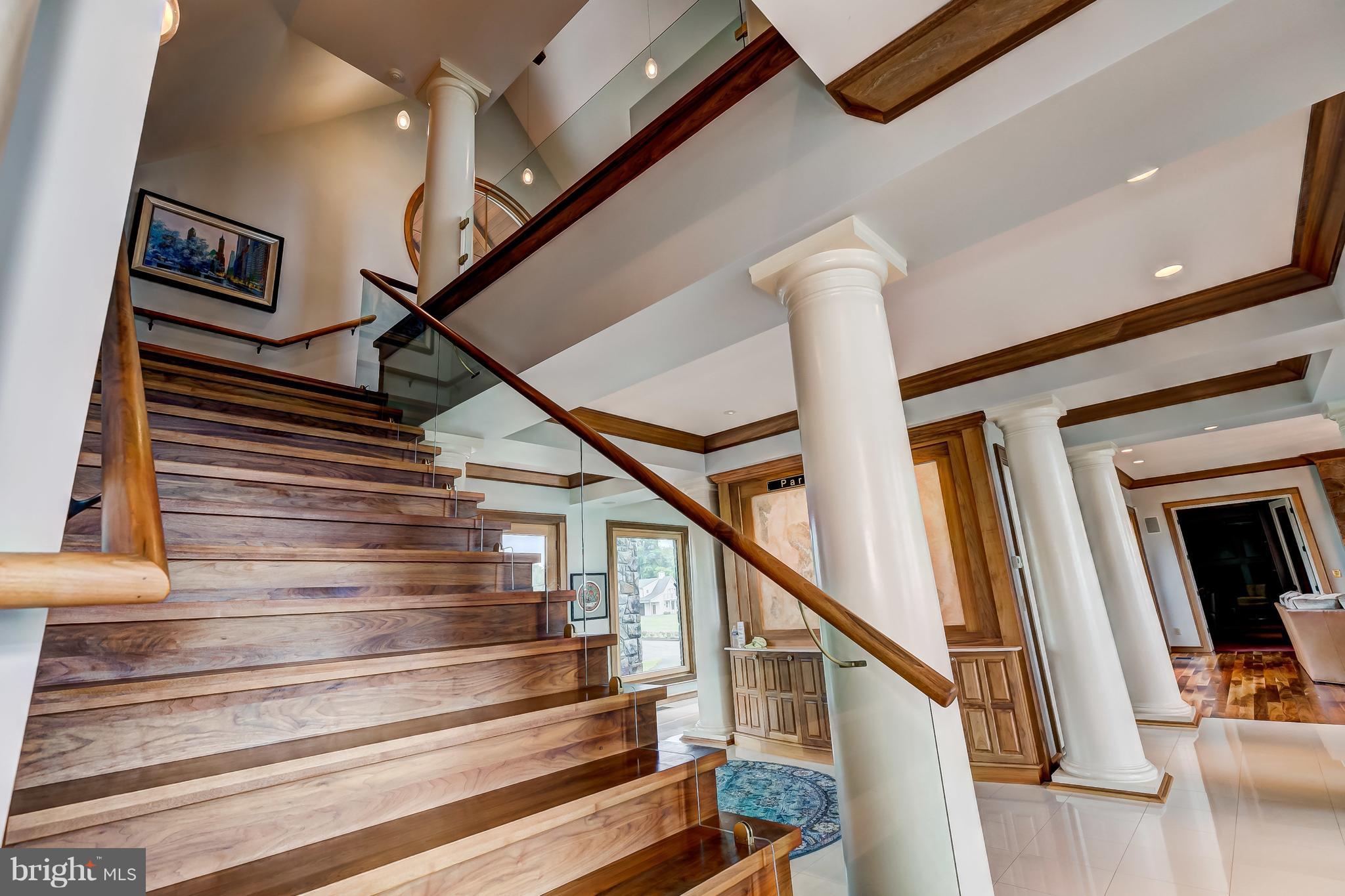 7402 Kent Point Road Stevensville, MD 21666 - Photo 40 of 134 Brazilian walnut stairs continues to upper level