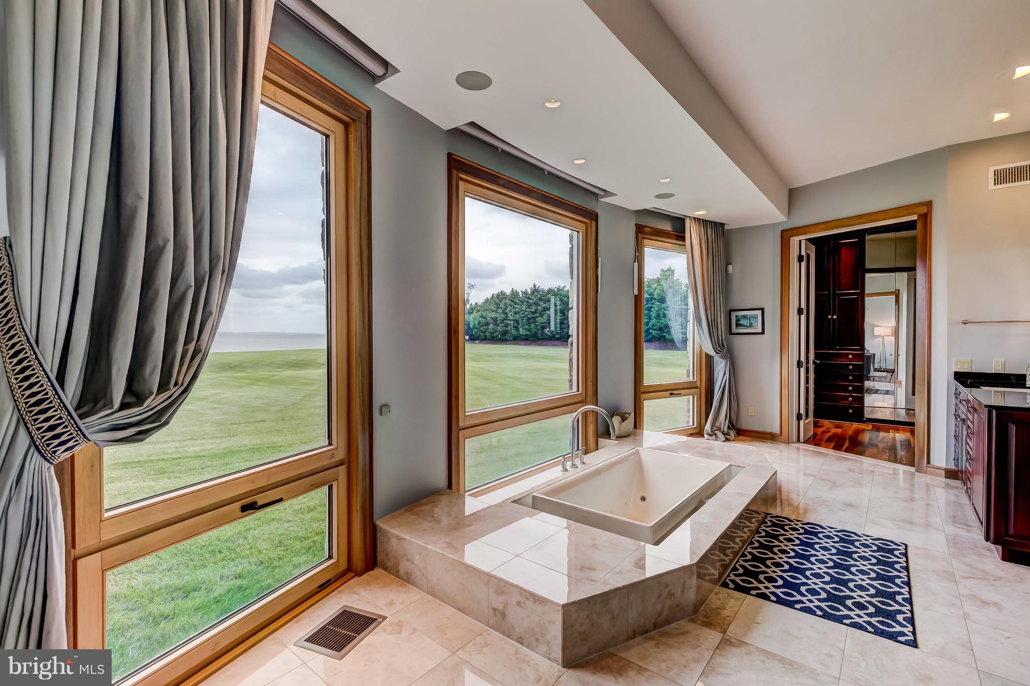 7402 Kent Point Road Stevensville, MD 21666 - Photo 56 of 134 Primary bath has sunken tub and Bay views for days