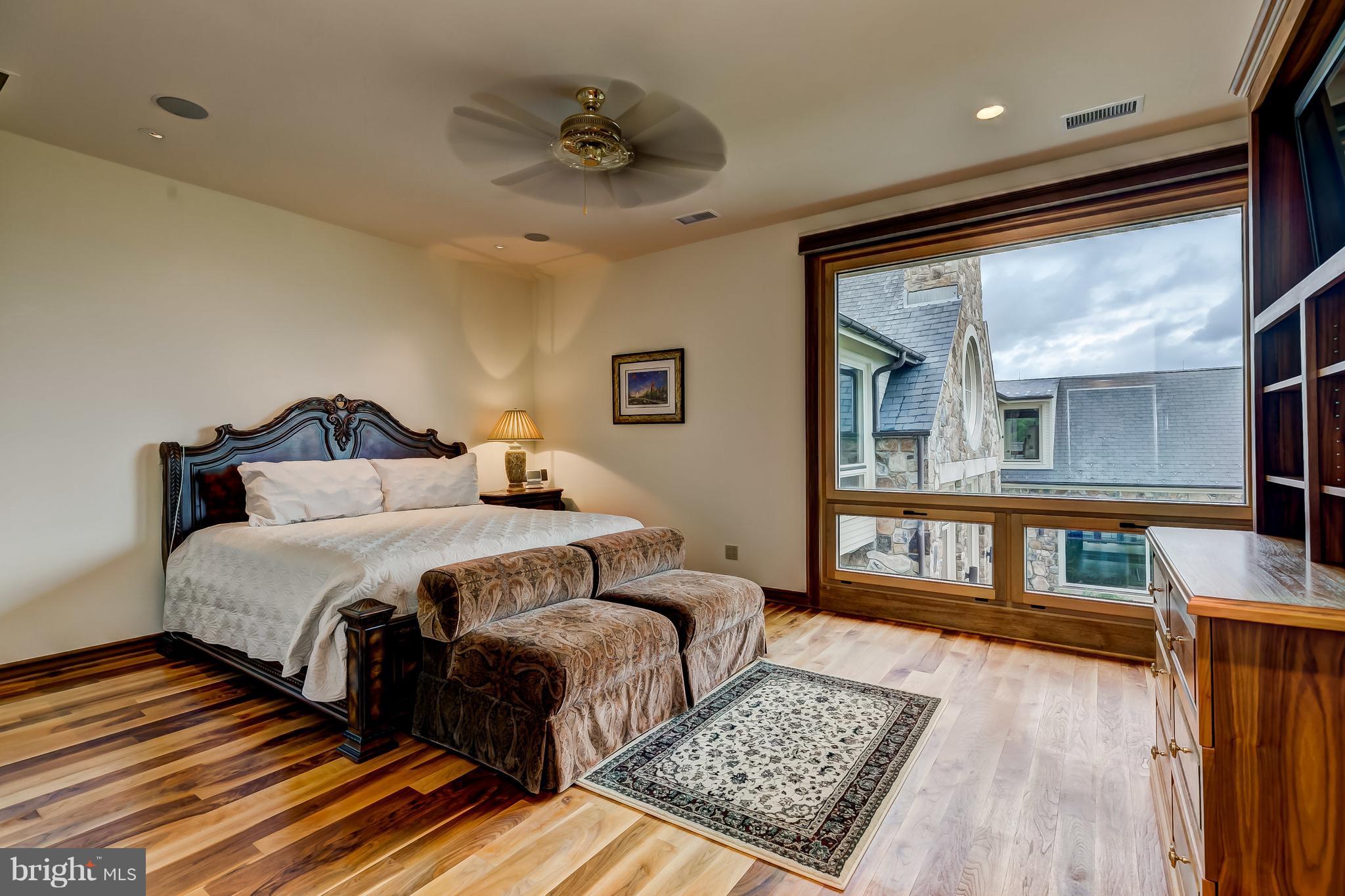 7402 Kent Point Road Stevensville, MD 21666 - Photo 68 of 134 Upper level bedroom with large covered patio