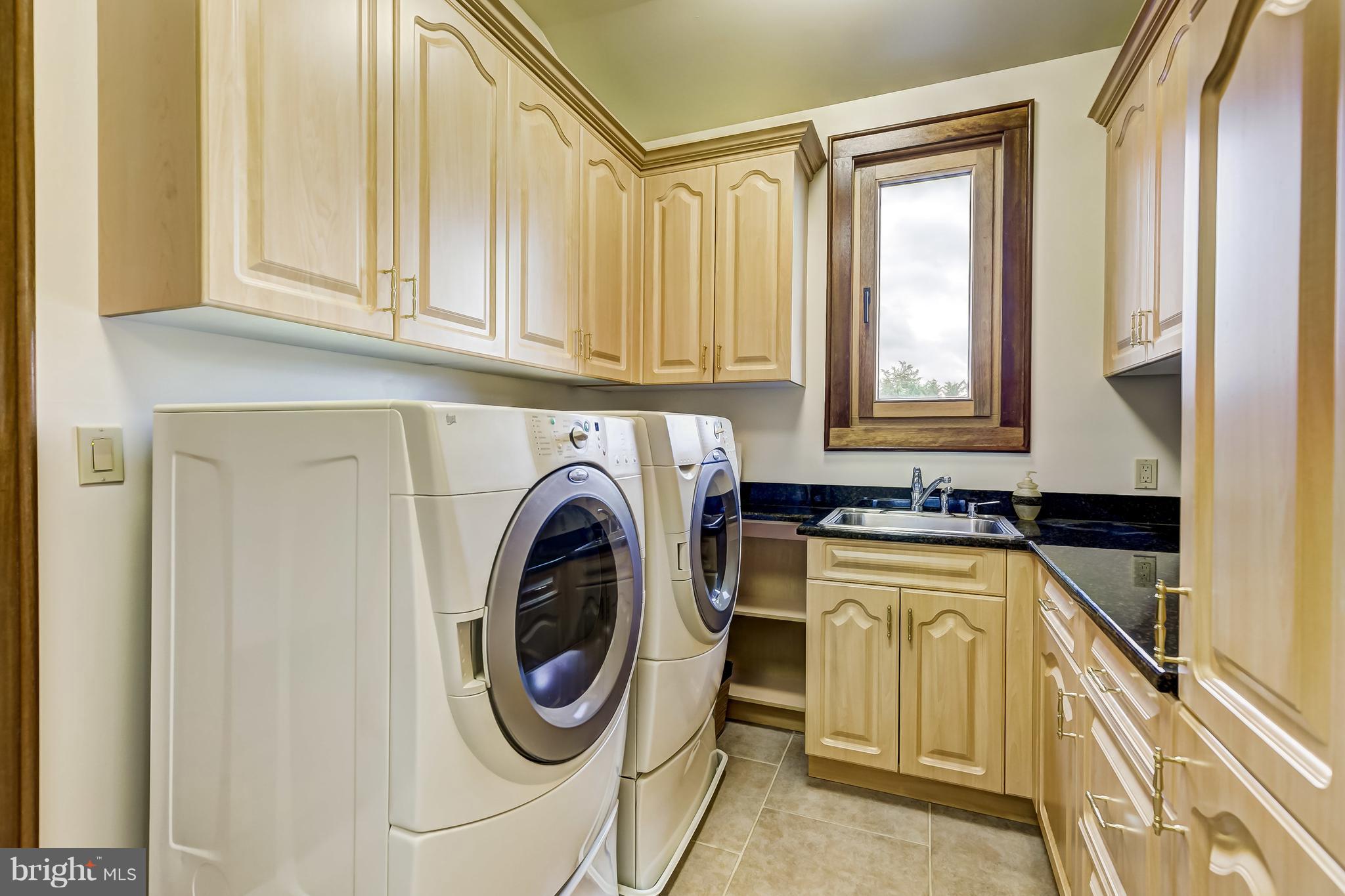 7402 Kent Point Road Stevensville, MD 21666 - Photo 75 of 134 Upper level laundry room and storage