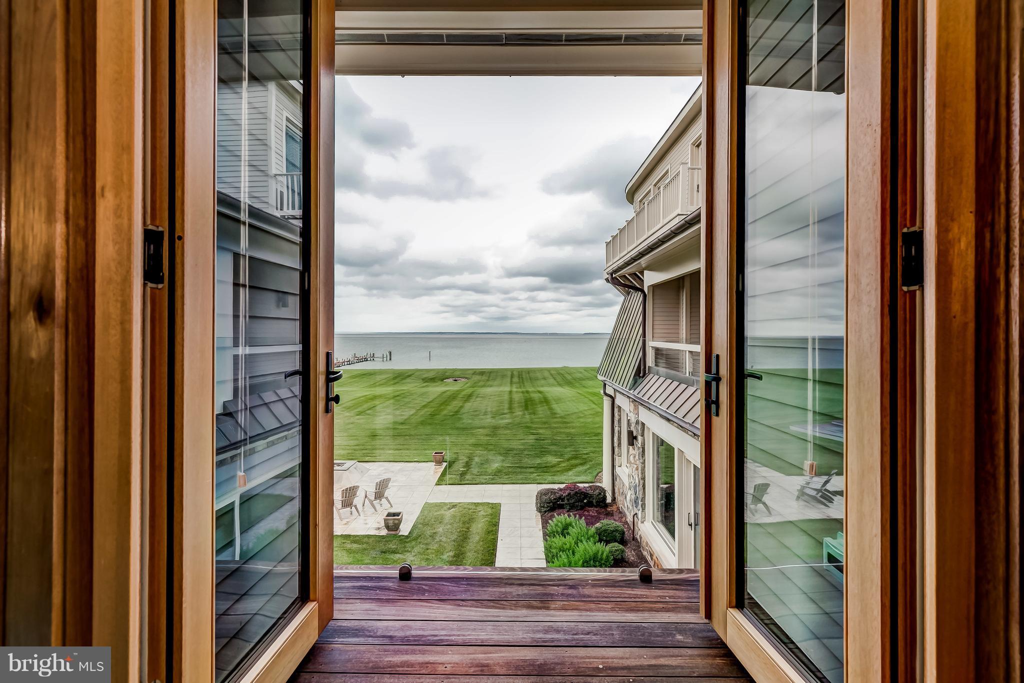 7402 Kent Point Road Stevensville, MD 21666 - Photo 80 of 134 Private deck overlooks grounds with Bay backdrop