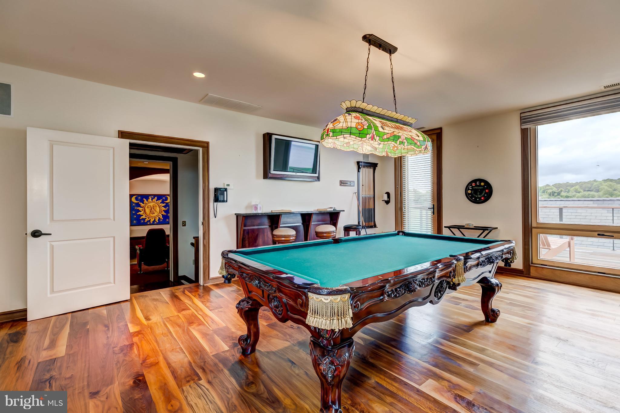 7402 Kent Point Road Stevensville, MD 21666 - Photo 90 of 134 Access to upper level deck from game room