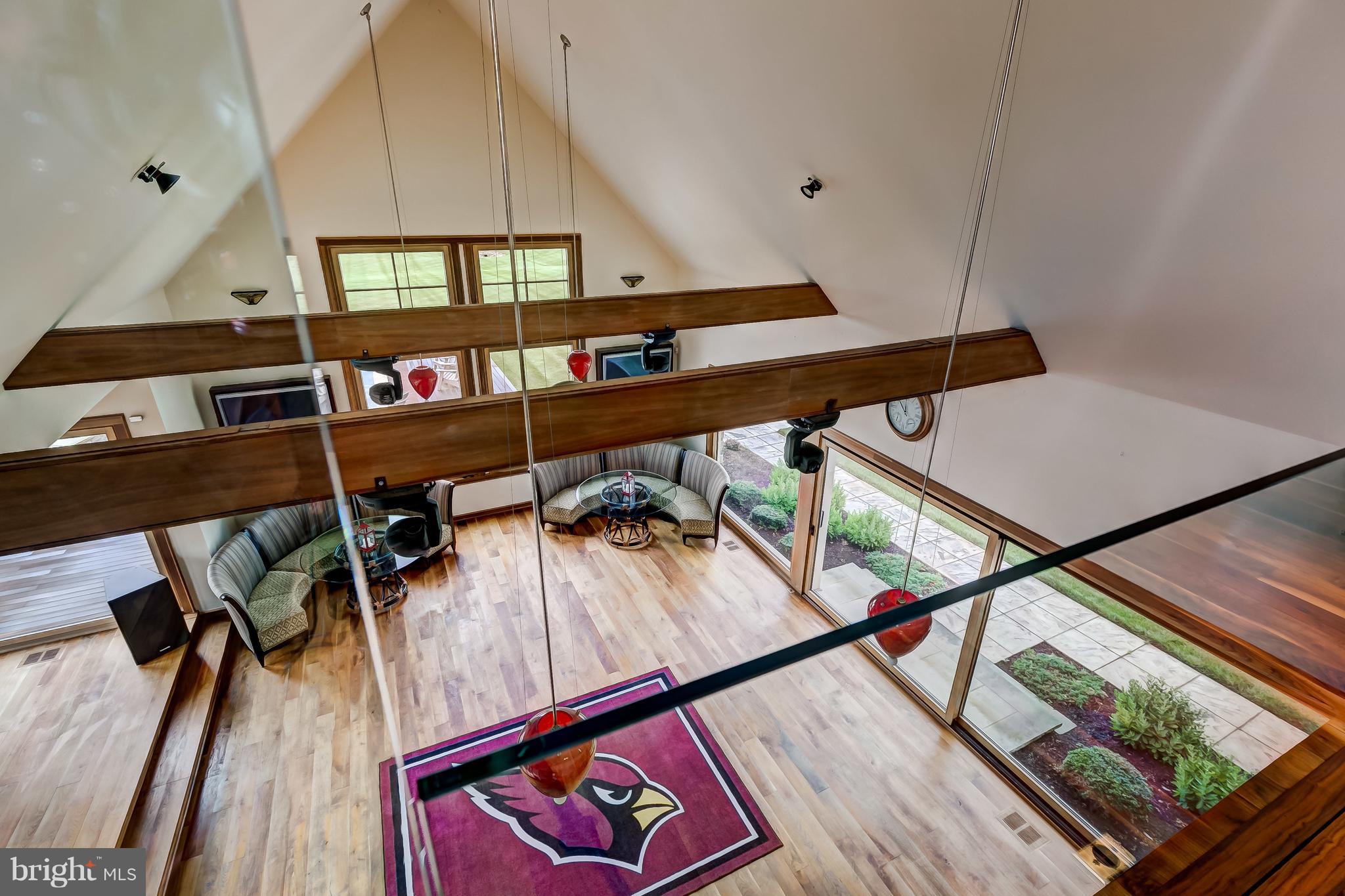 7402 Kent Point Road Stevensville, MD 21666 - Photo 92 of 134 Overlook from game room into the Club room