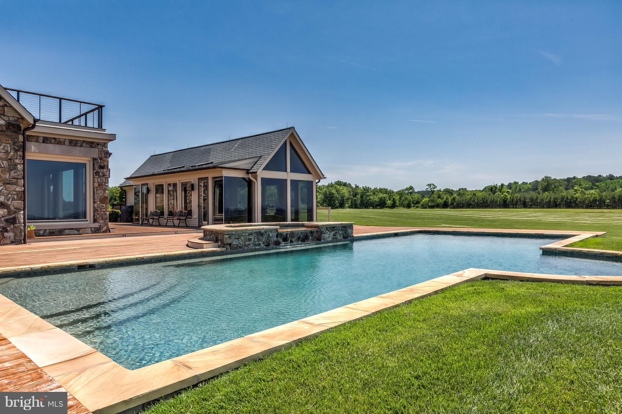 7402 Kent Point Road Stevensville, MD 21666 - Photo 93 of 134 Pool with built-in sun deck