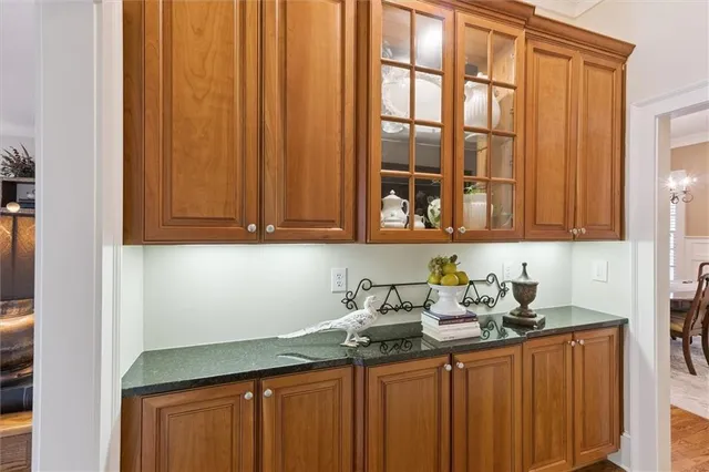 a bedroom with a bed and a ceiling fan