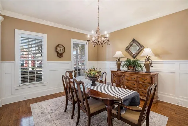 a bedroom with a bed and a table in it