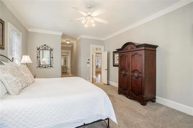 a view of a balcony with wooden floor and fence