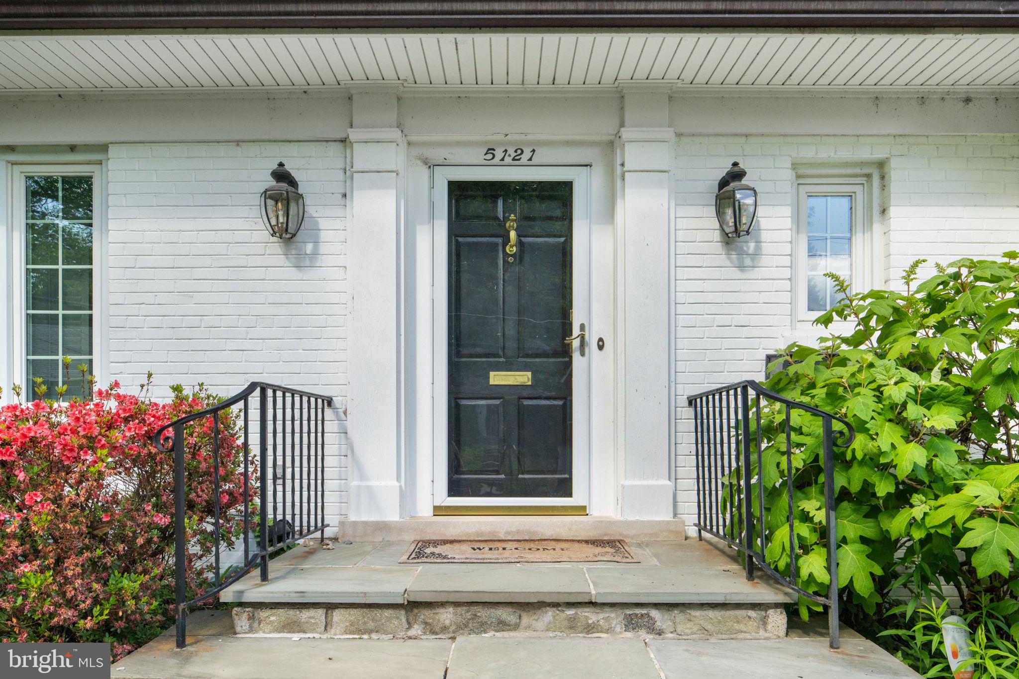 5121 Baltan Road Bethesda, MD 20816 - Photo 3 of 54 Charming entrance with lush greenery.