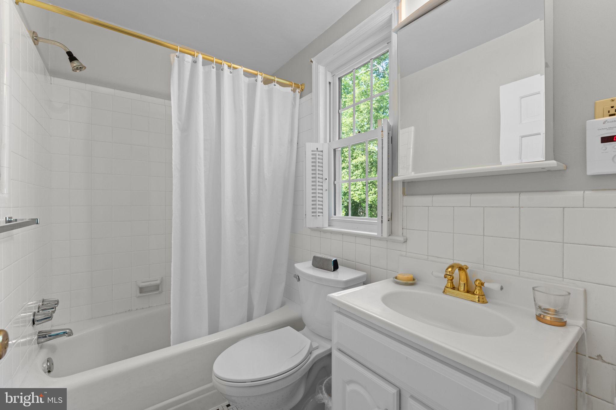 5121 Baltan Road Bethesda, MD 20816 - Photo 33 of 54 Bright and airy bathroom retreat.