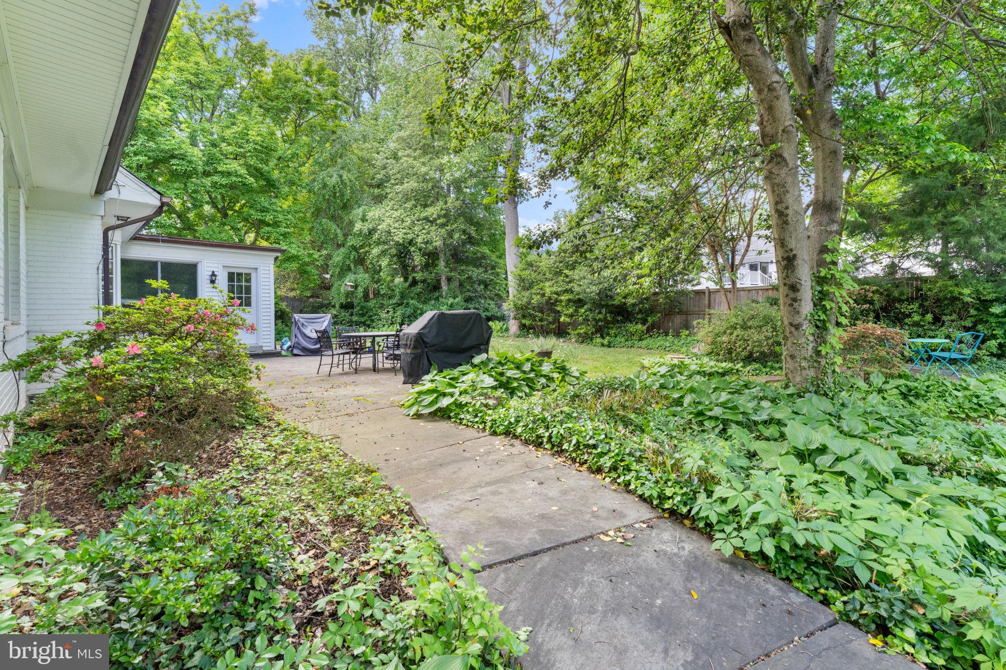 5121 Baltan Road Bethesda, MD 20816 - Photo 47 of 54 Lush garden path invites tranquility.