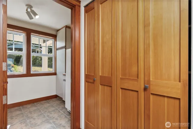 a view of an empty room with a window