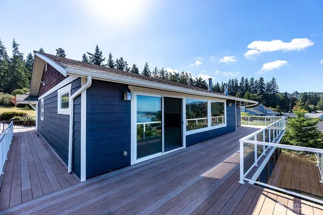 a view of a hallway with front door