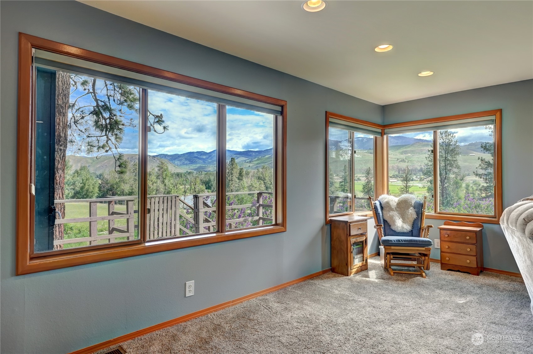 6 Rising Eagle Road Twisp, WA 98856 - Photo 11 of 40 a view of a room with lounge chair and windows