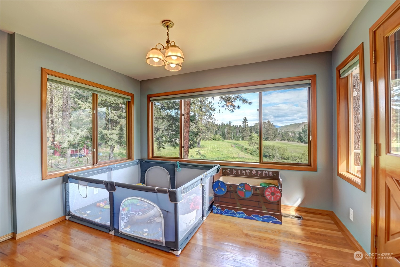 6 Rising Eagle Road Twisp, WA 98856 - Photo 15 of 40 a living room with furniture and a large window