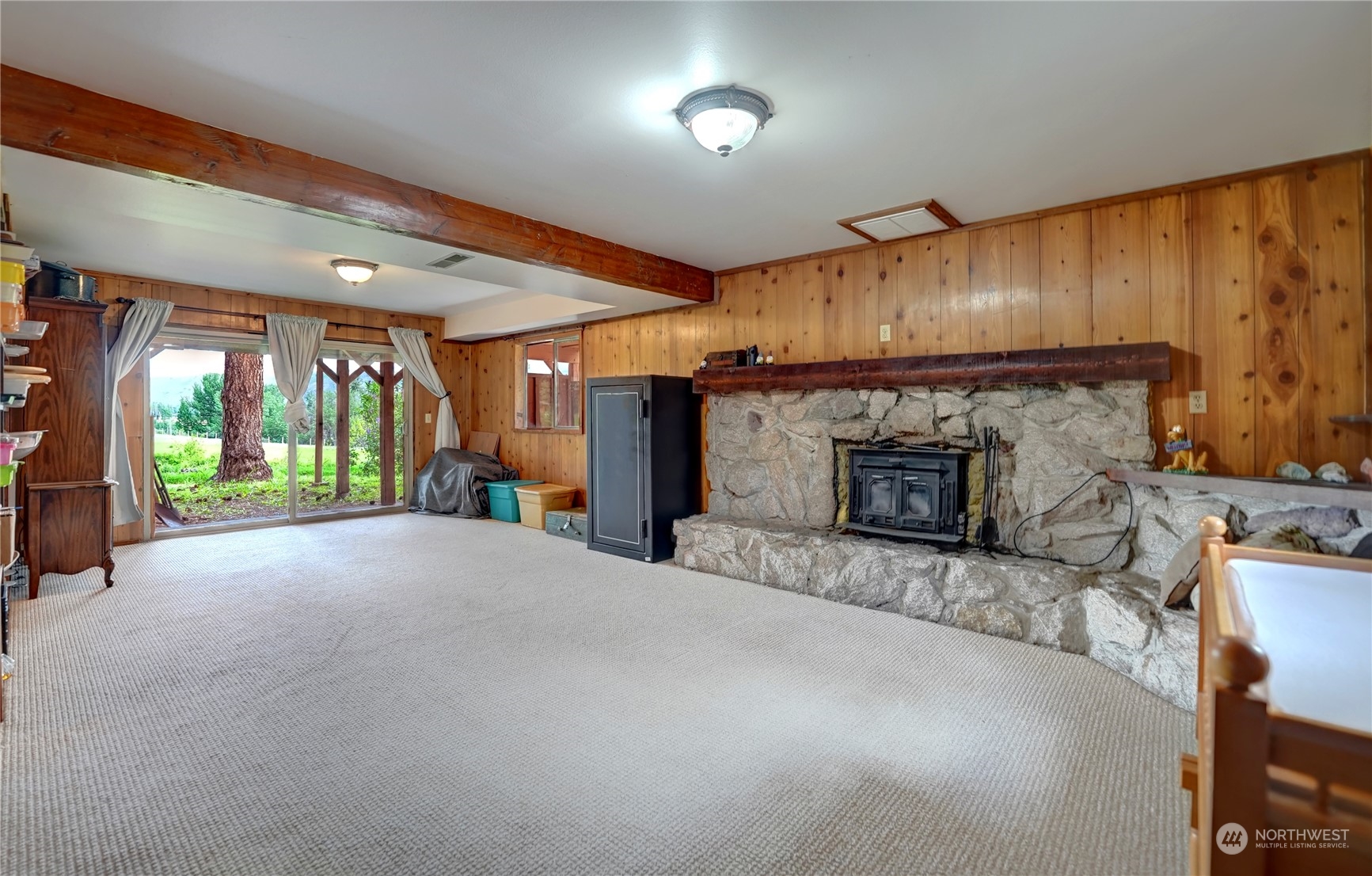 6 Rising Eagle Road Twisp, WA 98856 - Photo 27 of 40 a open kitchen view with fireplace and a window