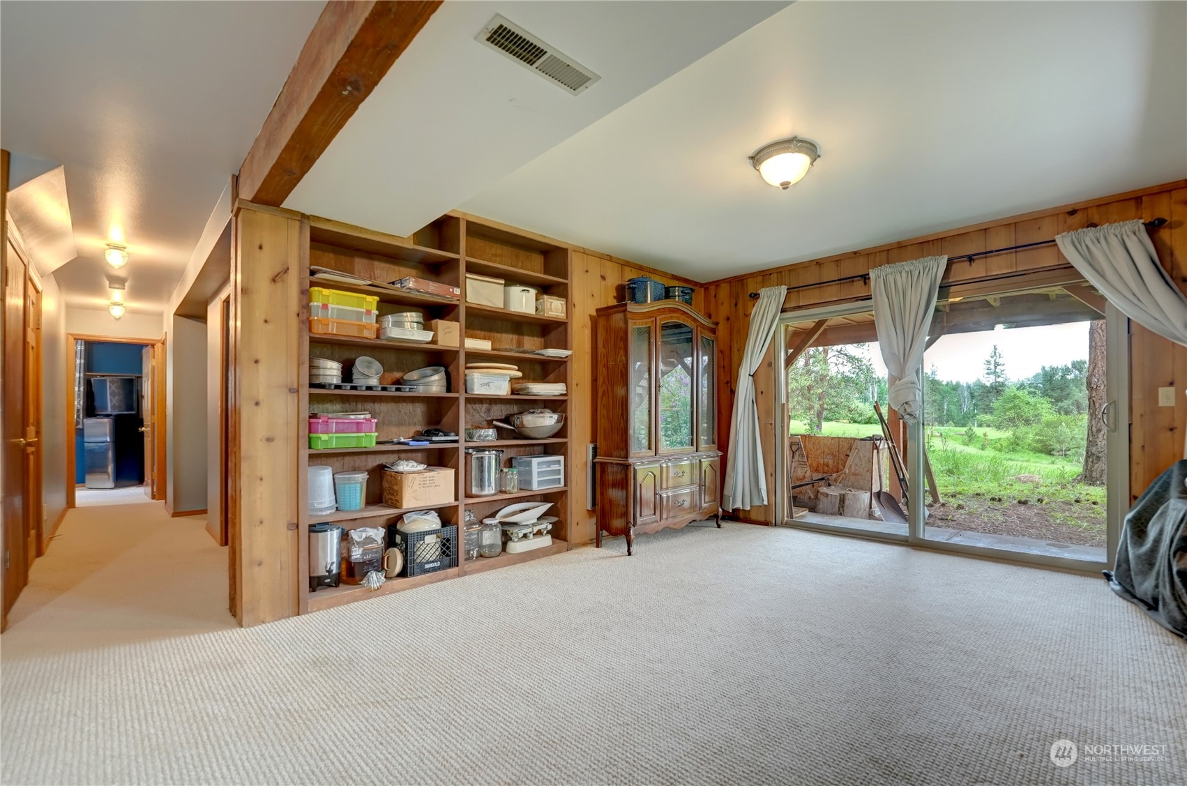 6 Rising Eagle Road Twisp, WA 98856 - Photo 29 of 40 a view of an empty room with a balcony
